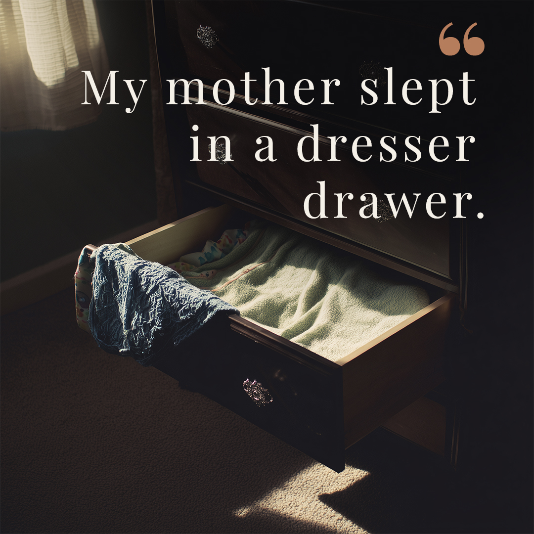 A quiet bedroom with an open dresser drawer lined with a folded green blanket and a small quilt — the makeshift crib where the author's mother slept as a newborn.